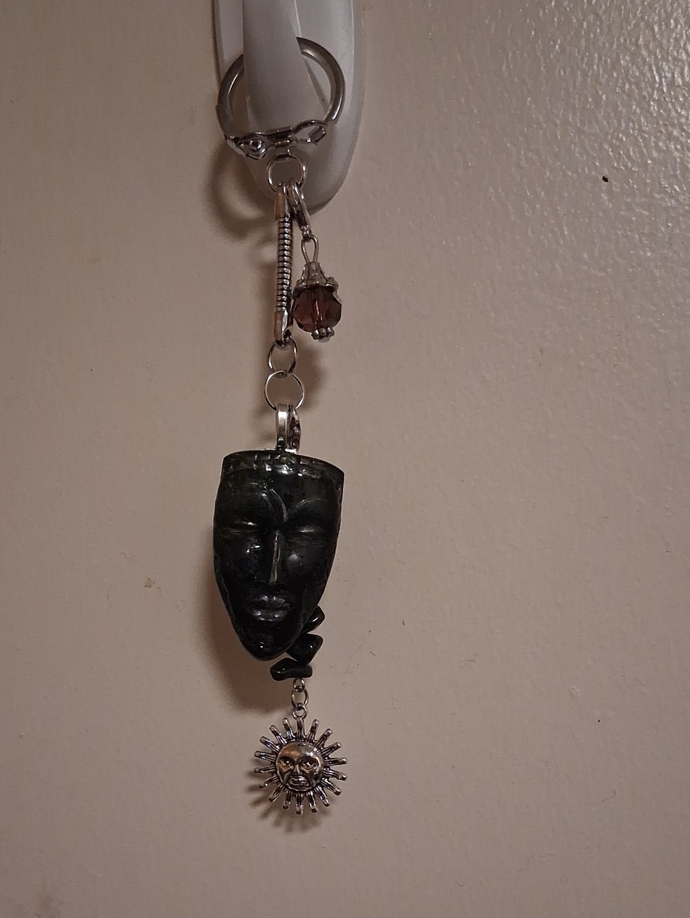 Handcrafted Dark Green Stone Mask Pendant Keychain with Sun Charm